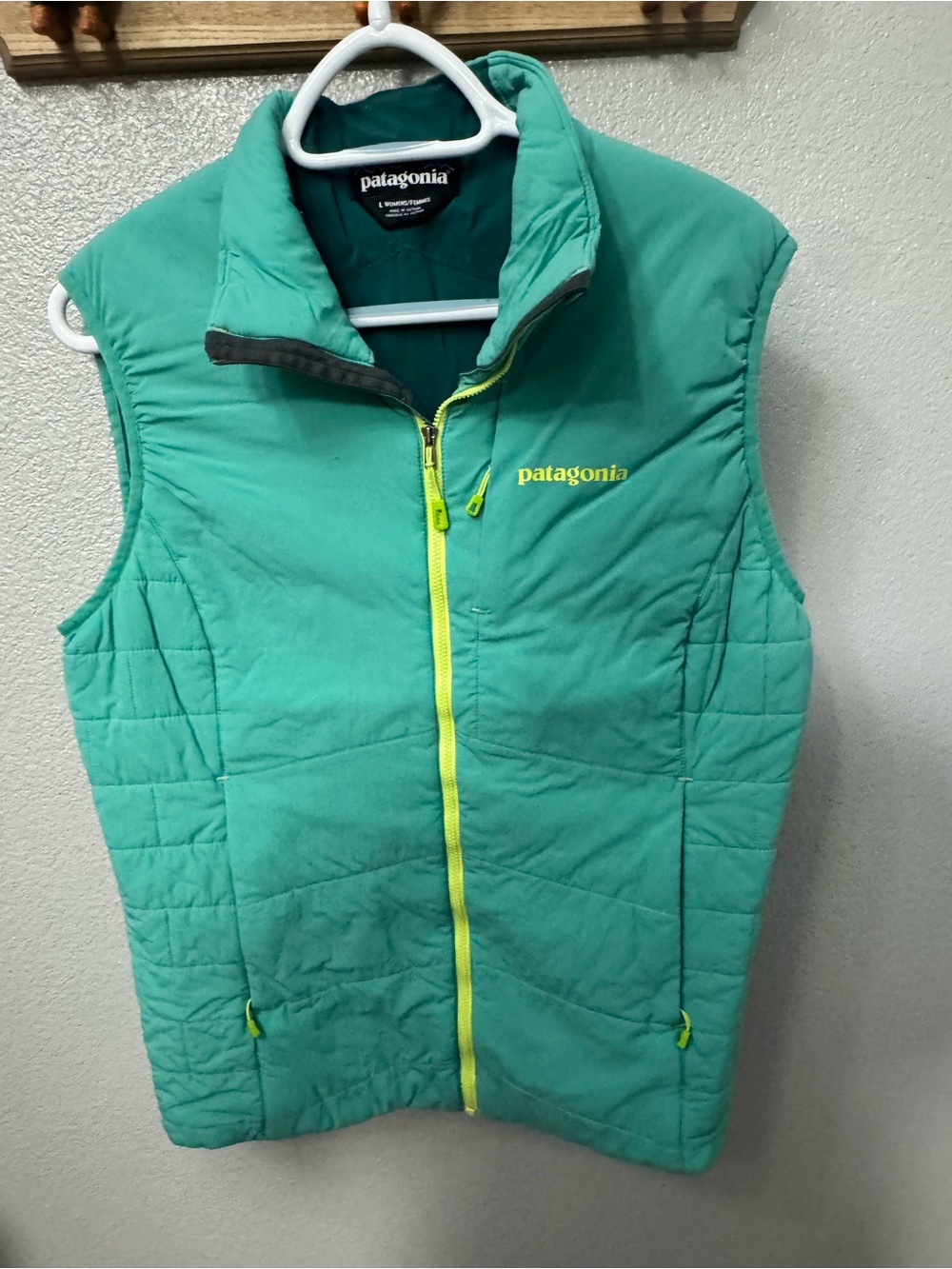 Patagonia Teal Green Vest with Yellow Zipper